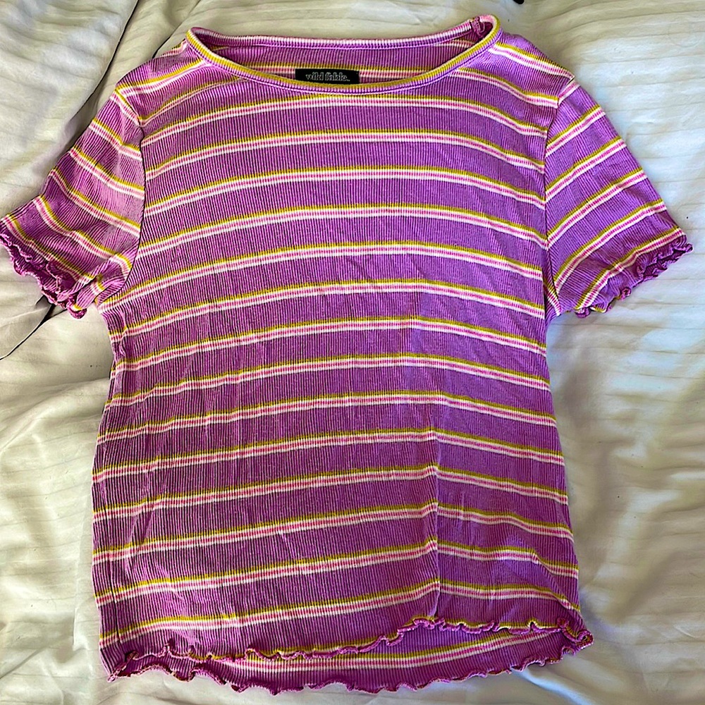 A stylish, multi color shirt, the size is a medium, the brand is Wild Fable.